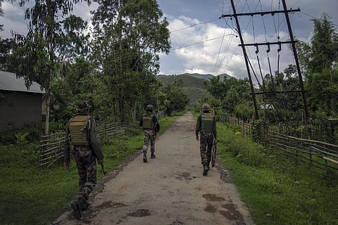 FILE - Indian army soldiers patrol a deserted village in Manipur, Tuesday, June 20, 2023. (Photo | AP)
