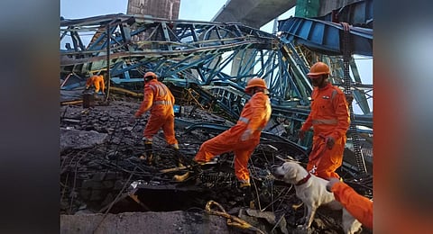 NDRF personnel during a search and rescue operation following a crane accident along the under-construction Samruddhi Expressway, in New Thane, Aug 1, 2023. (Photo | PTI)