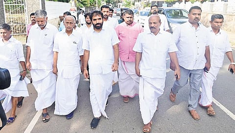 Chandy Oommen arriving at St George Church in Puthuppally along with senior leader K C Joseph and others to attend a funeral on Wednesday | Vishnu Prathap