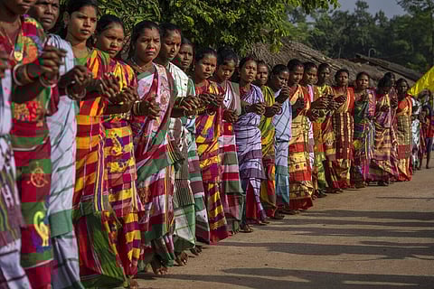 FILE - Image of Tribal women from Odisha's Guduta, performing an indigenous folk dance, used for representational purposes only. (Photo | AP)