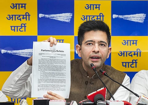 AAP MPs Raghav Chadha with party MPs address a press conference on the issue of false allegations and alleged breach of privilege (Photo | PTI)