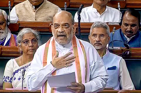 Home Minister Amit Shah speaks in the Lok Sabha during the Monsoon session of Parliament, in New Delhi, Friday (Photo | PTI)