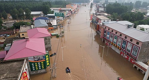 Aerial view shows a flooded village after heavy rains in Zhuozhou, Baoding city, in northern China’s Hebei province. (Photo | AFP)