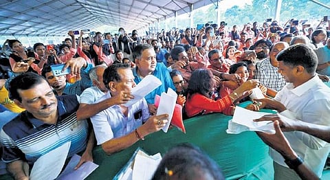 Pandian receiving petitions from the public at a meeting on Friday | Express