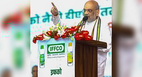 Union Home Minister Amit Shah speaks during the foundation stone laying ceremony of the IFFCO Nano DAP (Liquid) plant, at Kandla in Kutch district (Photo | PTI)