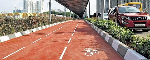 A view of India’s first solar-roofed bicycle track along the ORR at Nanakramguda in Hyderabad on Friday that is all set for inauguration in the first week of September. (Photo | Express)