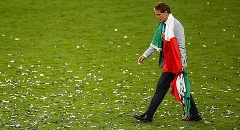 Italy's manager Roberto Mancini walks on the pitch after defeating England at the Euro 2020 soccer championship final at Wembley stadium in London, Sunday, July 11, 2021.(Photo | AP)