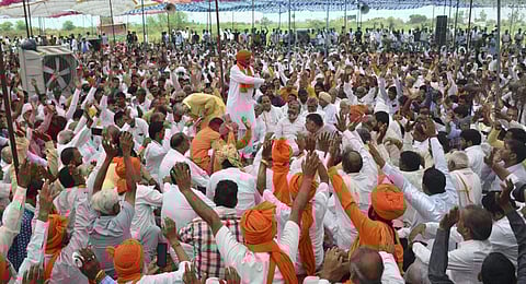 People attend a 'Mahapanchayat' called by Hindu outfits, at Pondri village in Palwal District. (Photo | PTI)