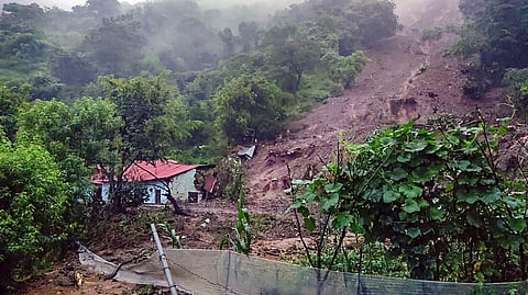 A house buried under mud following a cloudburst on Sunday night, in Solan district, Monday, Aug. 14, 2023. (Photo | PTI)