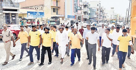 Minister for Public Works E V Velu inspecting the restoration work at Ayyankulam near Arunachaleswarar temple on Sunday | Express