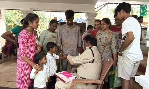 TTD is introducing the security tag to children at 7th mile on the trek way. (Photo | Express)