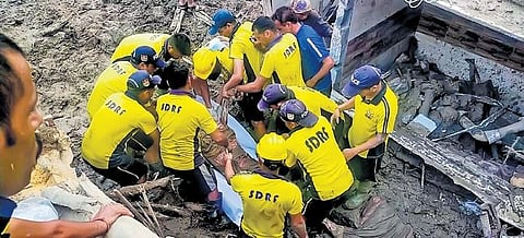 SDRF personnel during a search and rescue operation in Rishikesh on Tuesday. (Photo | PTI)