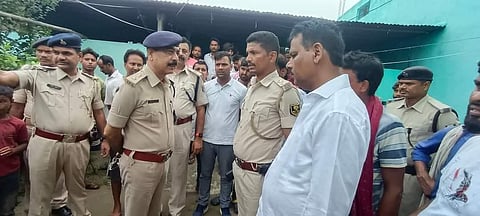 Senior police officers inquiring about the incident from slain journalist's family members.