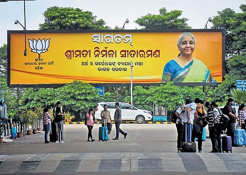 A hoarding on Finance Minister Nirmala Sitharaman’s visit to the state at Bhubaneswar airport | DEBADATTA MALLICK