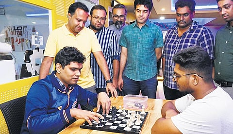 Visually impaired chess player Mohammed Salih engaged in a game of chess at Premier Chess Academy in Thiruvananthapuram on Tuesday. (Photo | Vincent Pulickal)