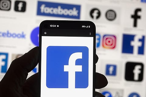 FILE - The Facebook logo is seen on a cell phone, Friday, Oct. 14, 2022, in Boston. (Photo | AP)