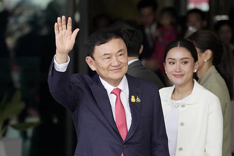 Thailand's former Prime Minister Thaksin Shinawatra (L), with his daughter Paetongtarn Shinawatra at the Don Muang airport in Bangkok, Aug. 22, 2023. (Photo | AP)