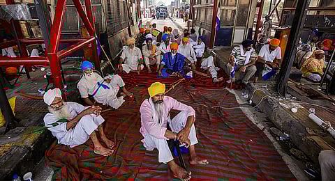 Farmers block a toll booth on the national highway near village Kathunangal, some 20km from Amritsar, Monday, Aug. 21, 2023. (Photo | PTI)