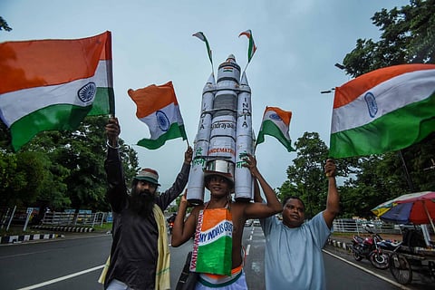 A man carries a model of Chandrayaan-3 in celebration (Photo | Debadatta Mallick, EPS)