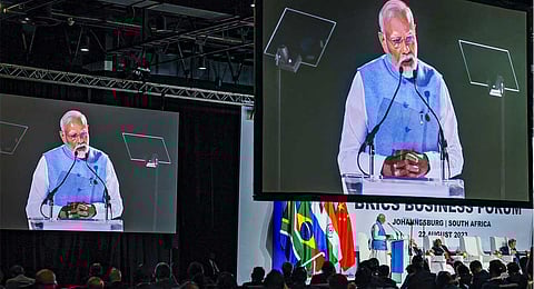 Prime Minister Narendra Modi speaks during the BRICS Business Forum Leaders Dialogue, in Johannesburg, Tuesday, Aug. 22, 2023. (PTI)