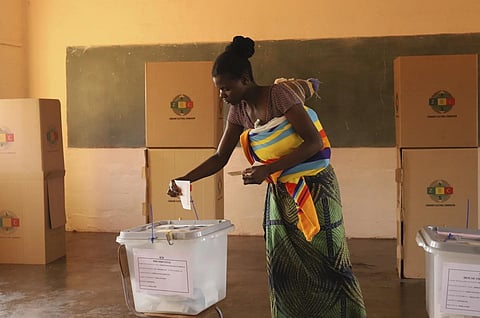 A woman casts her vote at a polling station in Kwekwe, Zimbabwe, August 23, 2023. (Photo | AP)