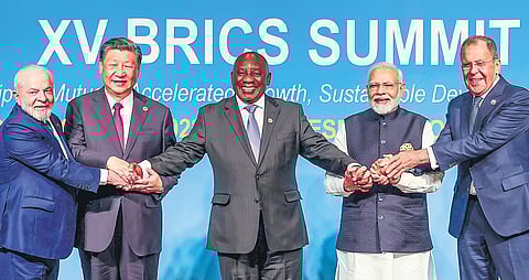 PM Modi and Chinese President Xi Jinping with other leaders at the BRICS Summit (Photo | PTI)