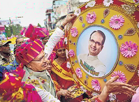 Shivraj Singh Chouhan is greeted by supporters in Shahdol on Wednesday | PTI