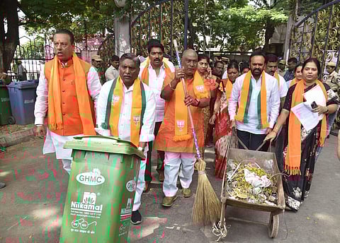 BJP corporators protest at GHMC Office during the GHMC Council meeting on Wednesday. (Photo | Vinay Madapu)