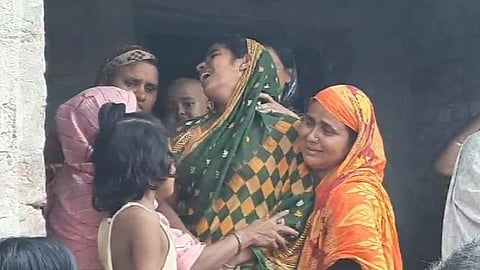 Families grieve the loss of their loved ones following the devastating collapse of the bridge. (Photo | Special Arrangement)