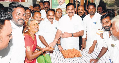 EPS distributed sweets to party workers at his residence in Salem | Express