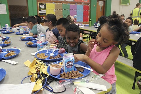 Students eating lunch in the cafetaria at Lowell Elementary School in Alburquerque, New Mexico, Aug 22, 2023. (Photo | AP)
