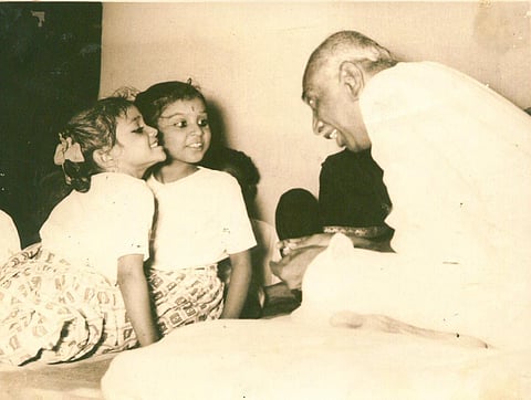 Chief Minister K Kamaraj is seen chatting with the kids | Express photo