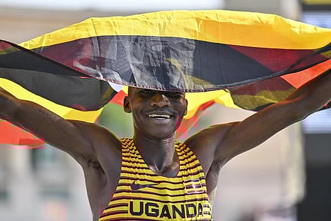 Victor Kiplangat of Uganda celebrates after winning the men's marathon at the World Athletics Championships in Budapest, Hungary, August 27, 2023. (Photo | AP)