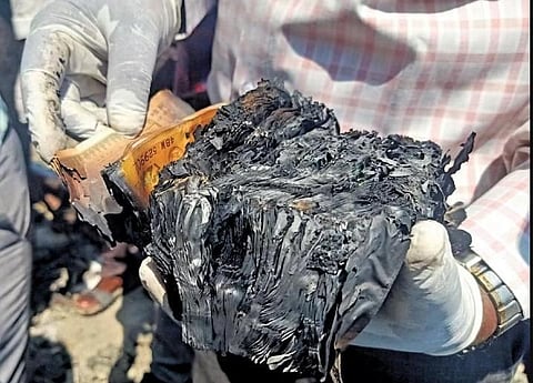 officials from the forensic department collected several samples, including burned currency bundles consisting of Rs 500, Rs 200, and Rs 100 notes. | Express