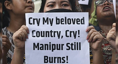 Protest over sexual violence against women and for peace in the ongoing ethnic violence in India's north-eastern state of Manipur. (Photo | AFP)