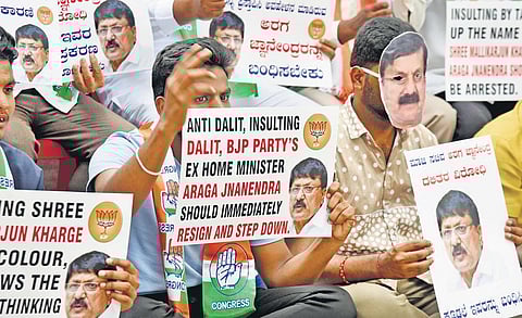 Congress members stage a protest against BJP MLA Araga Jnanendra in Bengaluru on Wednesday | vinod kumar t