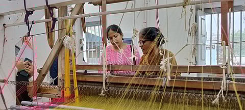 Students interacting with the artisans. (Photo | Express)