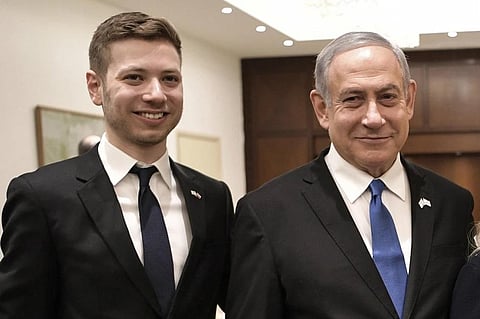 FILE - Israeli Prime Minister Benjamin Netanyahu, second from left, and son Yair, left, pose for a photo in Tel Aviv, Israel, Jan. 23, 2020. (Photo | AP)