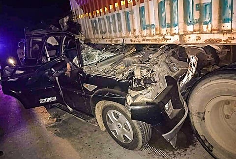 Mangled remains of a car is seen after an accident with a truck, at Sasaram, in Rohtas district on Wednesday. (Photo | PTI)