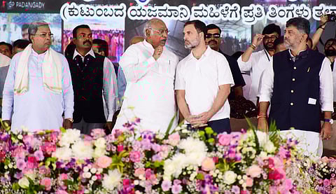 Chief Minister Siddaramaiah and Deputy Chief Minister DK Shivakumar look on during the launch of Gruha Lakshmi scheme. | Udayashankar S