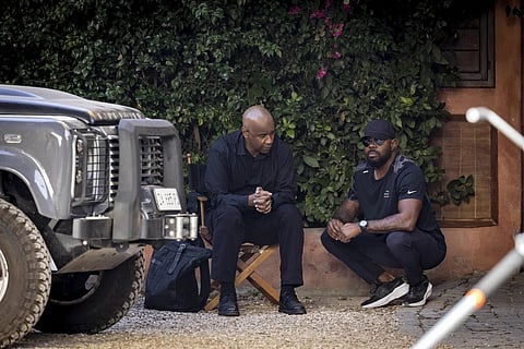 Denzel Washington, left, with director Antoine Fuqua on the set of 'The Equalizer 3.' (Photo | AP)