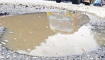 Rural Development Minister Errabelli Dayakar Rao was asked to rebuild the roads which were damaged in the recent rains and floods. (Photo | Express)