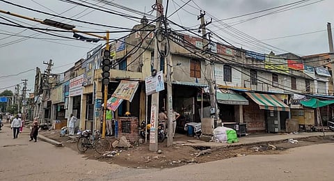 A Street wears a deserted look as shops seen closed in violent- hit Nuh. (Photo | PTI)