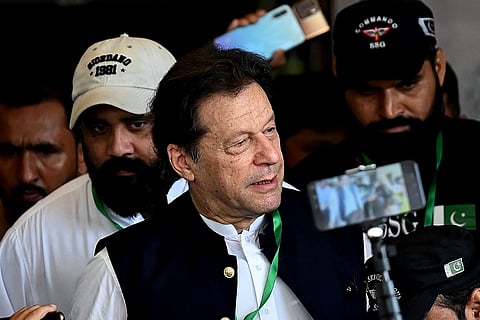 FILE - Pakistan's former Prime Minister Imran Khan (C) leaves after appearing in the Supreme Court in Islamabad on July 26, 2023. (Photo | AFP)