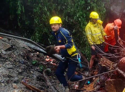 SDRF personnel removing debris in their search for missing people (Photo | Express)