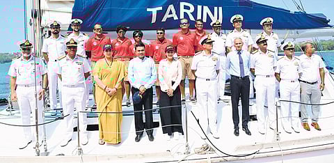 The six-member crew of INSV Tarini (in red) alongside Navy officers, Minister Smirit Irani, Goa CM Dr Pramod Sawant, and Rani Rampal, former captain of the Indian women’s hockey team