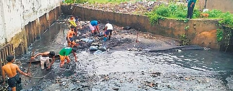 RMC workers clean drains after the city faced waterlogging | Express
