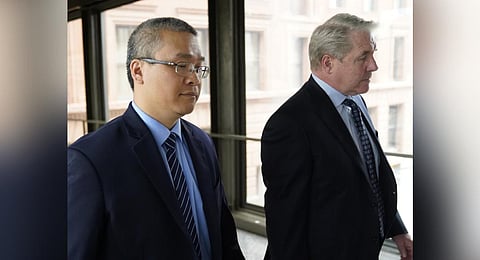 Tou Thao, left, a former Minneapolis police officer held back bystanders while his colleagues restrained a dying George Floyd. (Photo | AP)