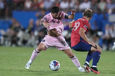 Inter Miami forward Lionel Messi gets around FC Dallas midfielder Paxton Pomykal during the second half of a Leagues Cup football match. (Photo | AP)