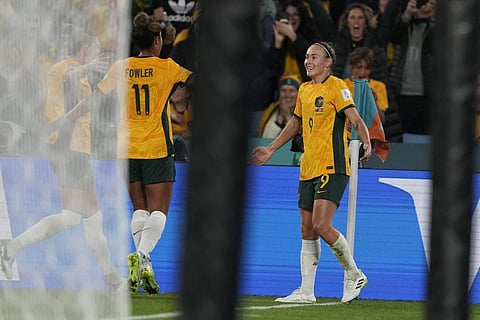 Australia's Caitlin Foord, right, reacts after scoring the opening goal of her team against Denmark, August 7, 2023. (Photo | AP)